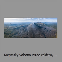 Karymsky volcano inside caldera, drone panorama